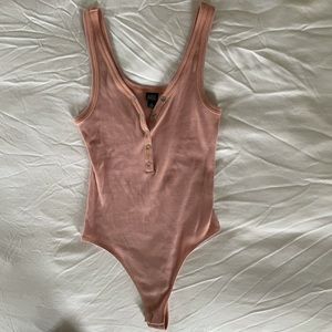 Mauve/pink body suit
